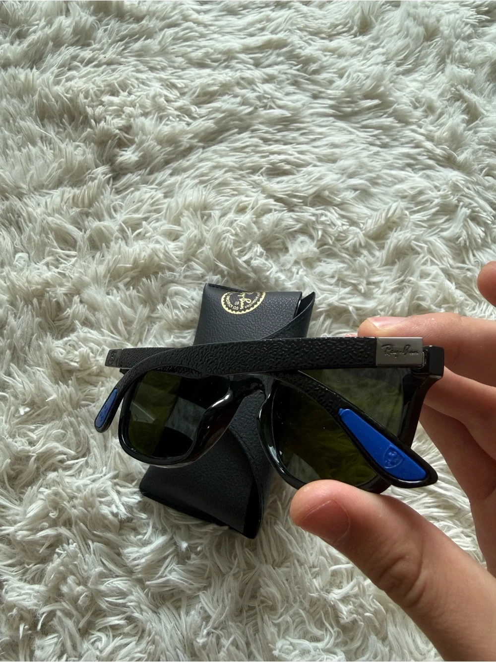 Ray-Ban Black Frame Sunglasses with Blue Mirrored Lenses